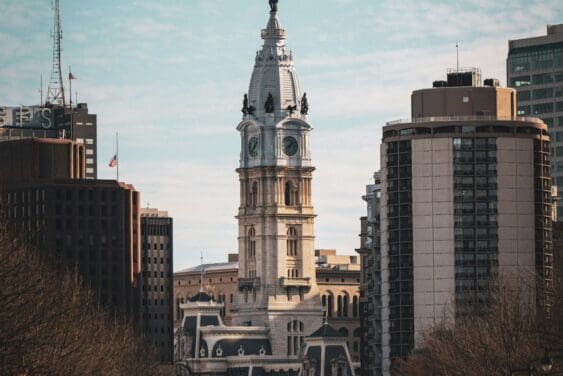 market street in philadelphia lined with international flags leading to city hall
