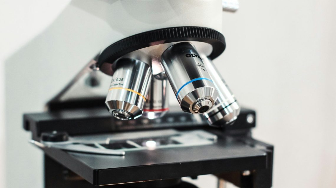 a close up of a microscope on a table