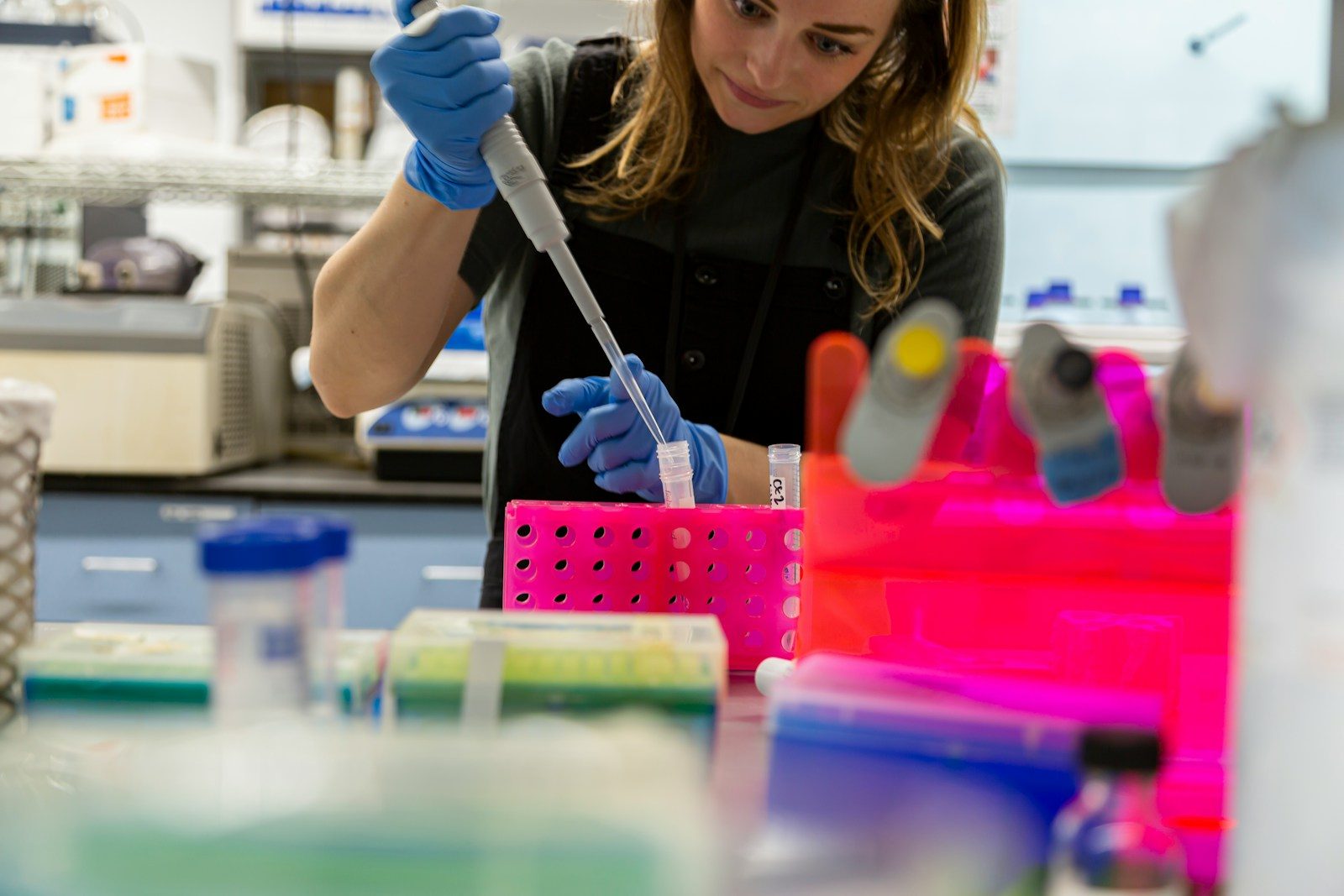Scientist uses pipette in a laboratory