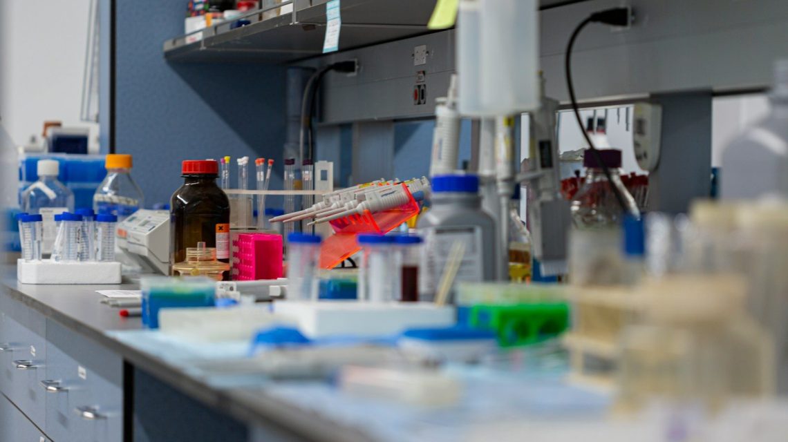 A laboratory bench with scientific equipment