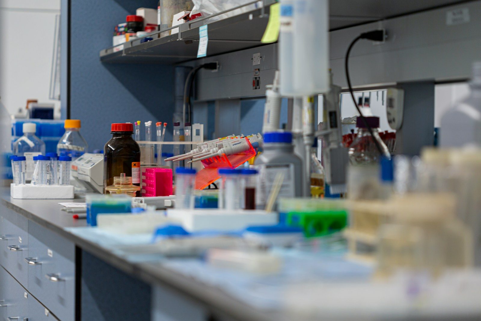 A laboratory bench with scientific equipment